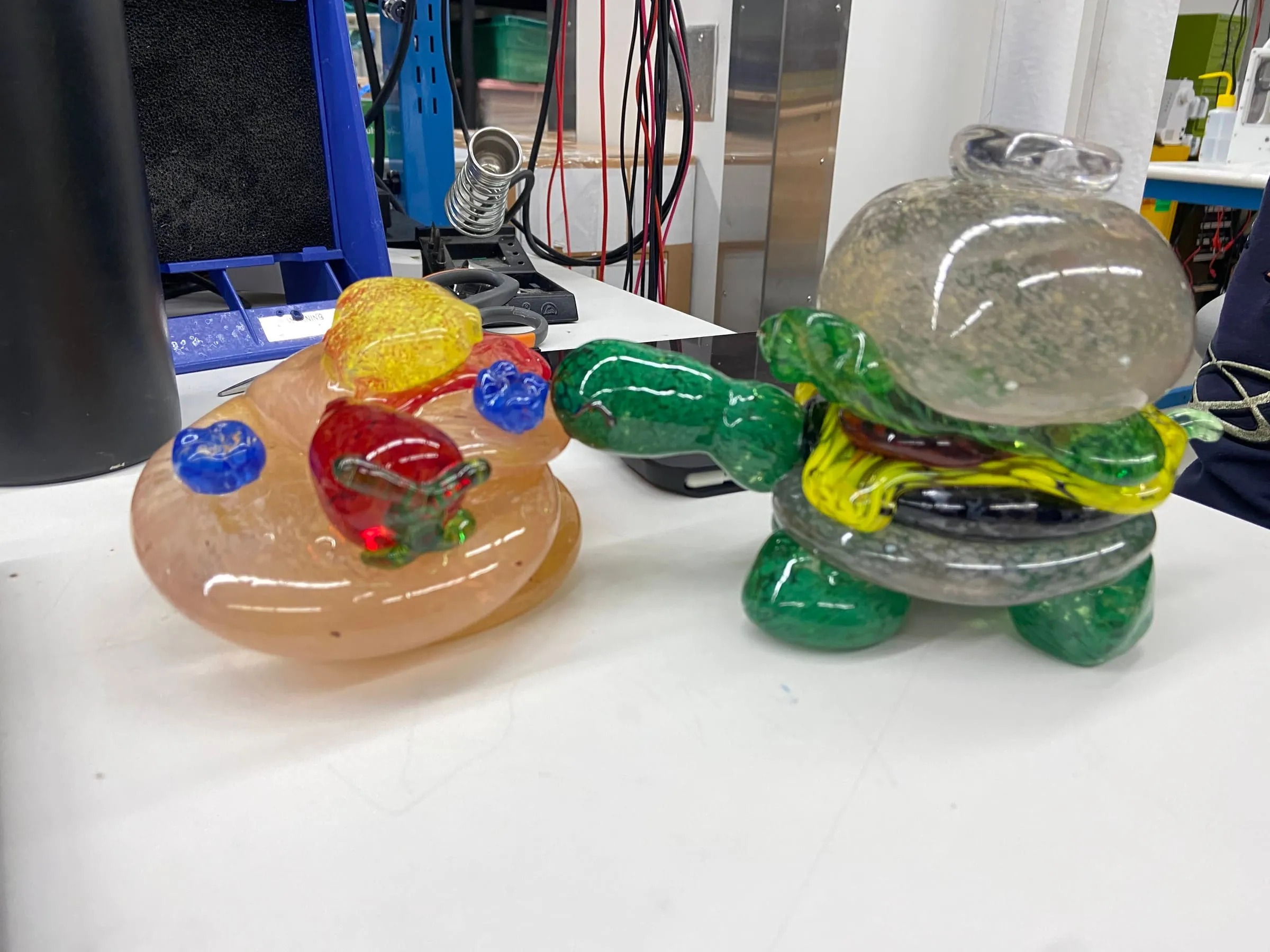 A stack of pancakes, next to a burger turtle made by Alayah Hines