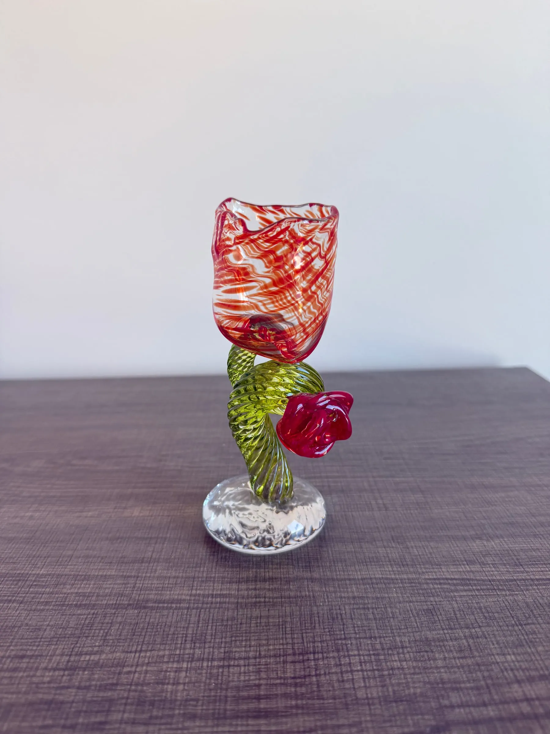 A goblet with a rose on the stem